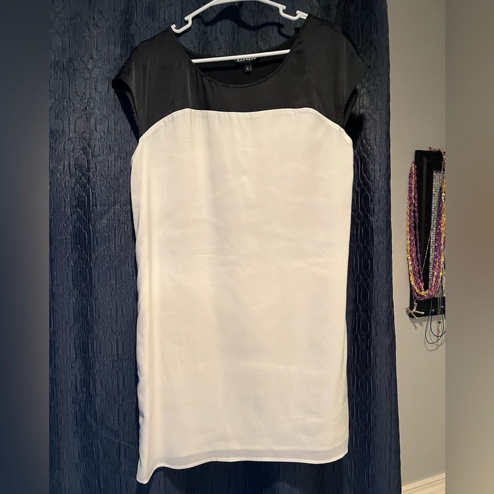 Express Dress - solid white on front and royal blue and black on back.